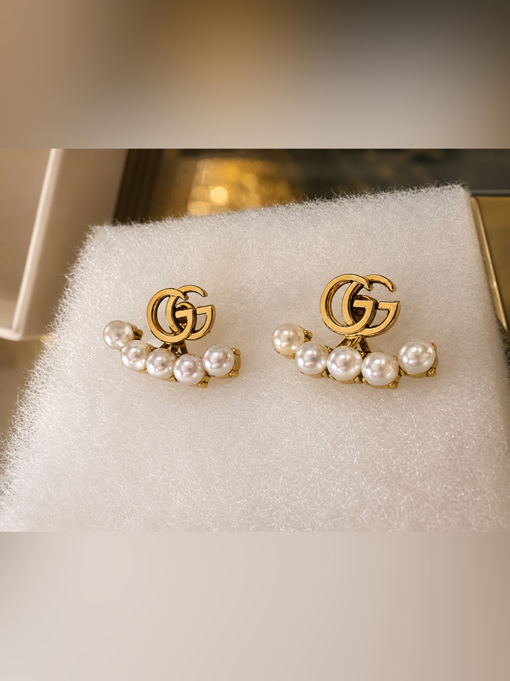 GG pearl accent earrings